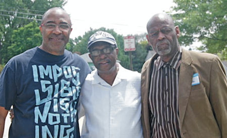 Left: John Milton, Middle: Minister Ronald Smith of New Covenant Church of Christ, Right: Pastor James E. Monroe also of the New Covenant Church of Christ. Photo by Elizabeth Stephens.